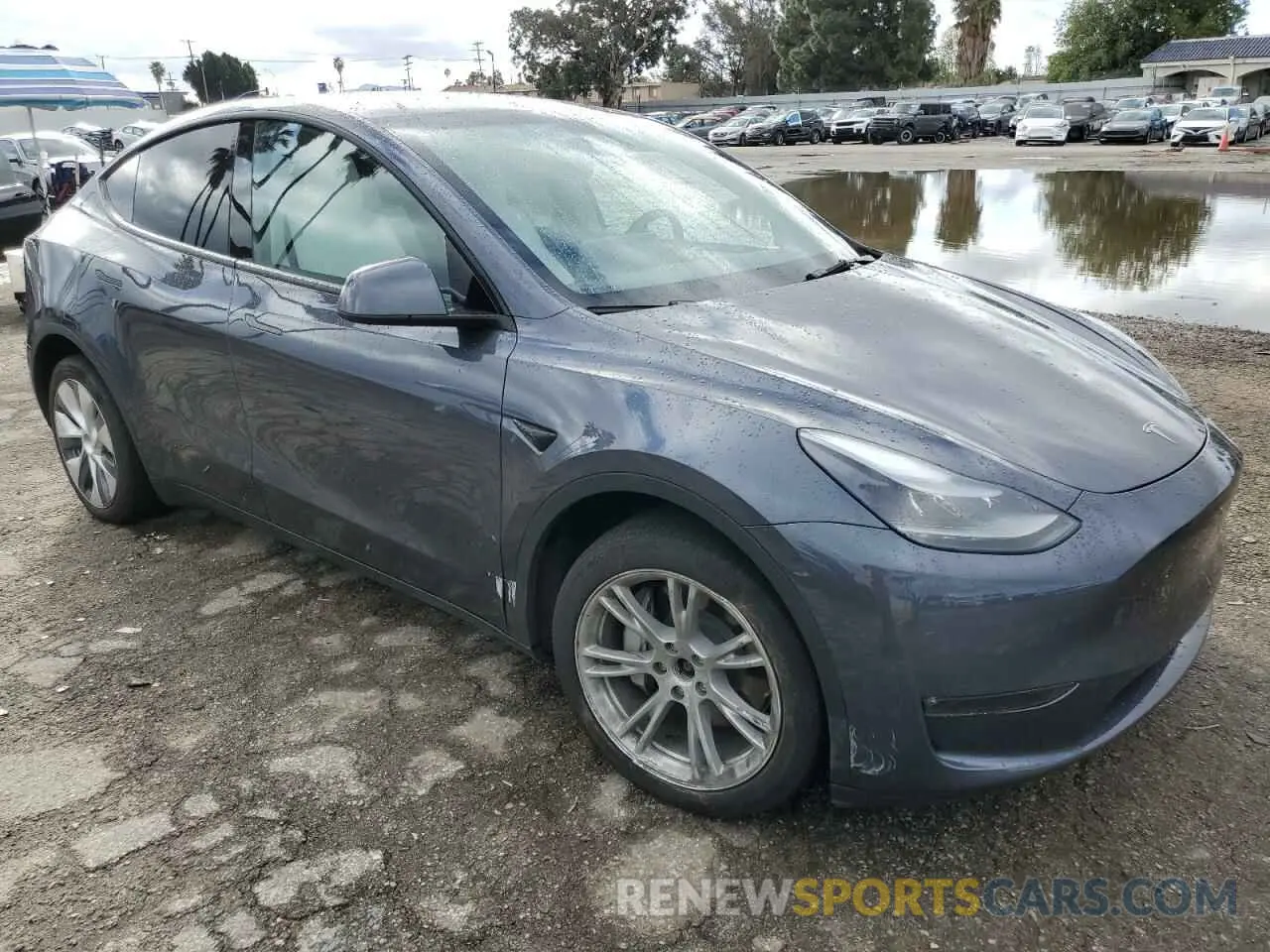 4 Photograph of a damaged car 7SAYGDEE7PA211007 TESLA MODEL Y 2023