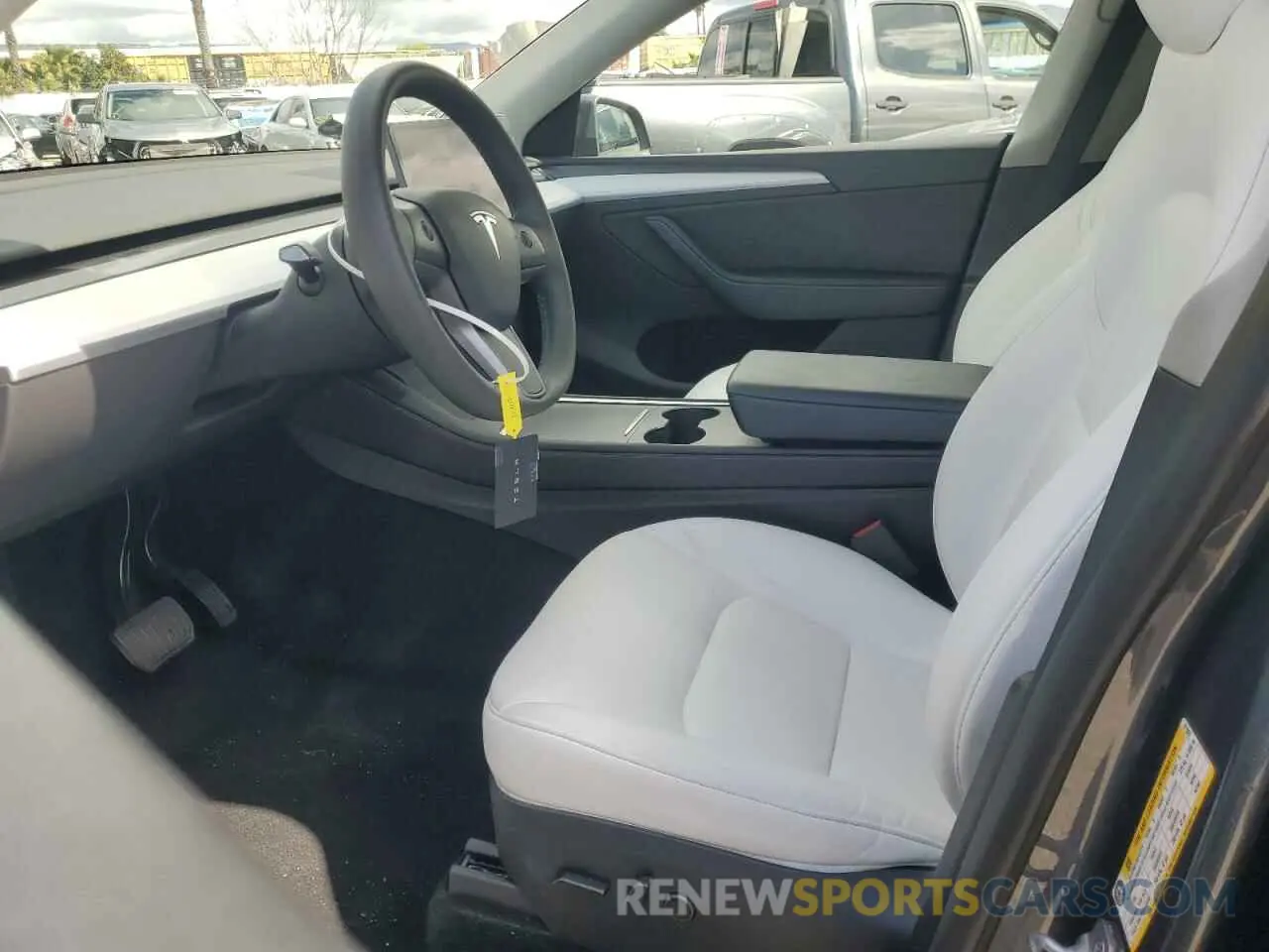 7 Photograph of a damaged car 7SAYGDEE7PA211007 TESLA MODEL Y 2023