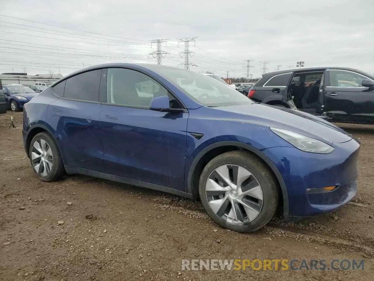 4 Photograph of a damaged car 7SAYGDEE7PF703927 TESLA MODEL Y 2023