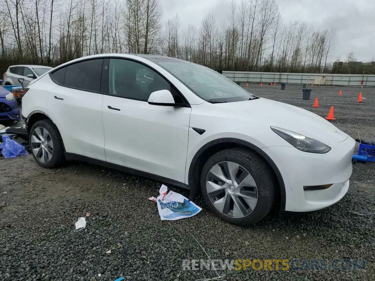 4 Photograph of a damaged car 7SAYGDEE7PF815465 TESLA MODEL Y 2023