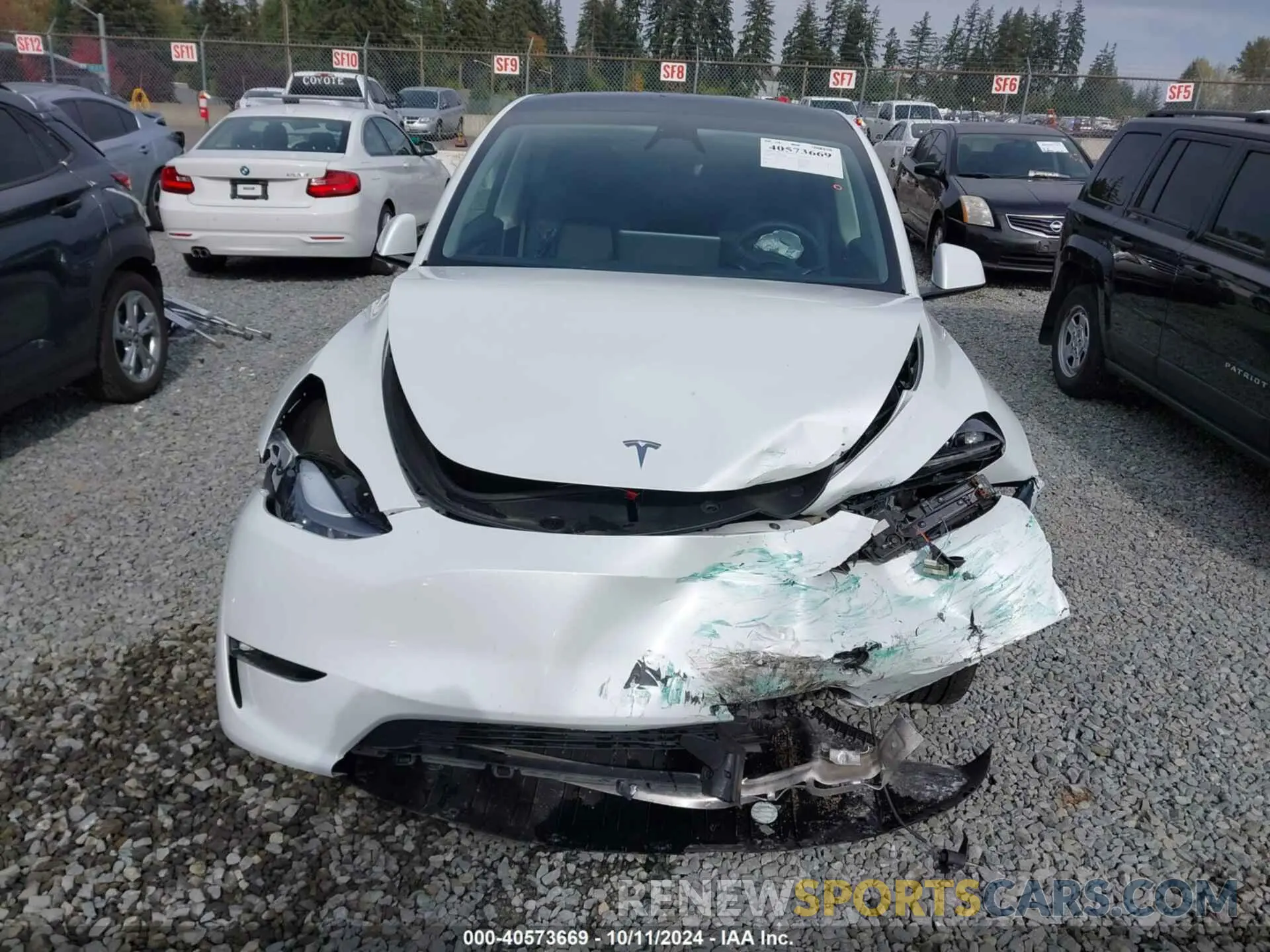 12 Photograph of a damaged car 7SAYGDEE7PF825106 TESLA MODEL Y 2023