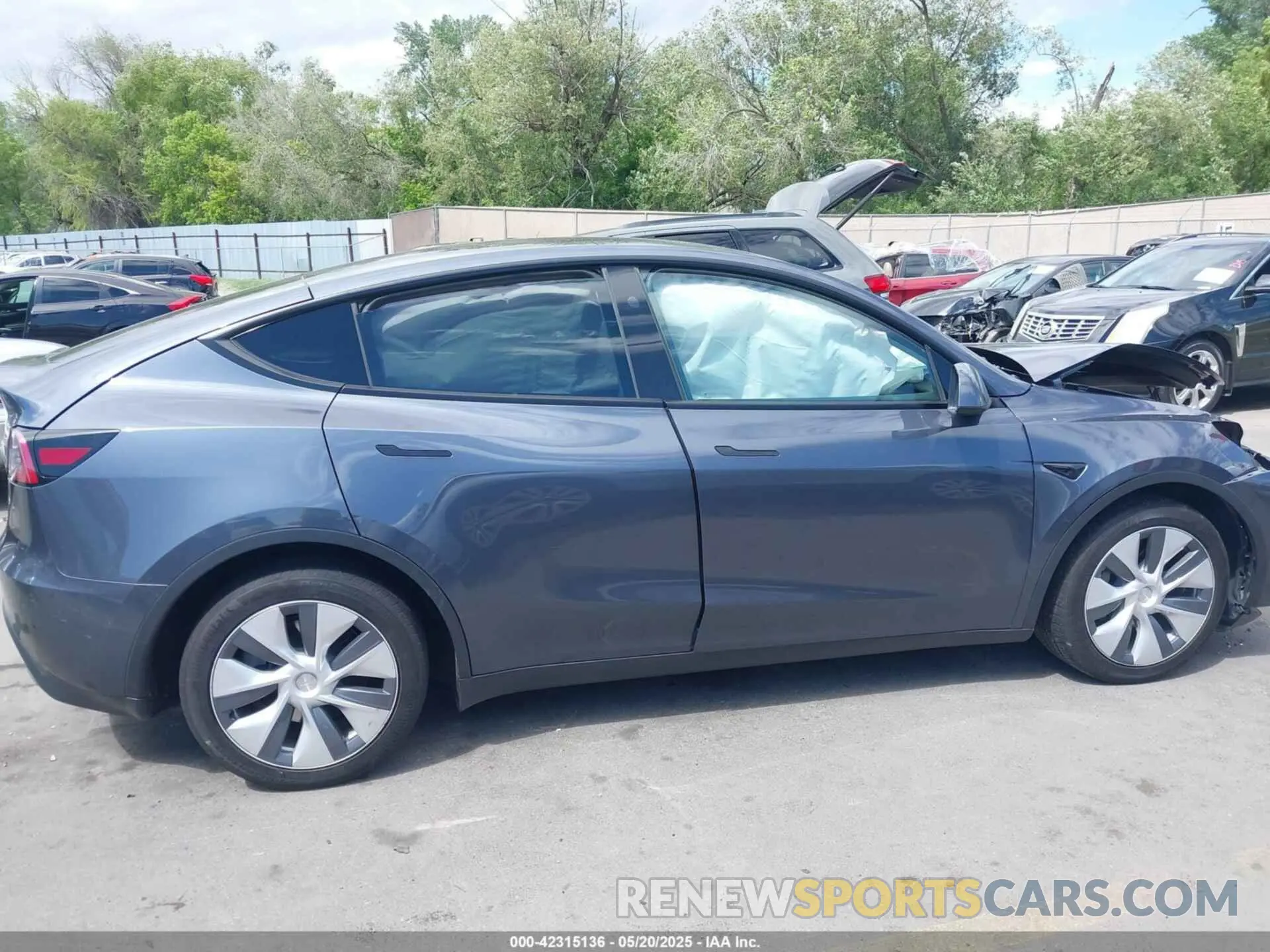 12 Photograph of a damaged car 7SAYGDEE7PF852113 TESLA MODEL Y 2023