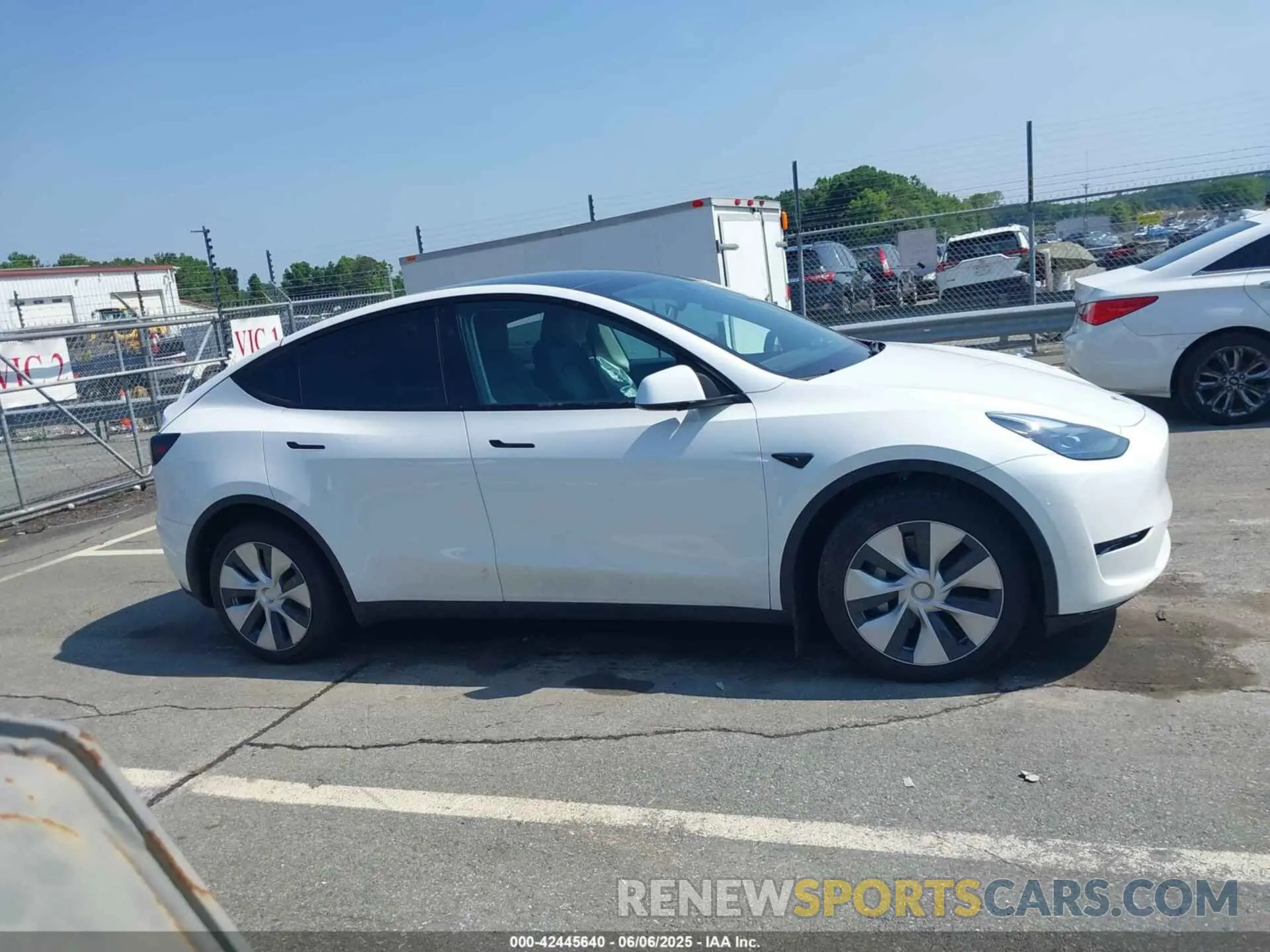 12 Photograph of a damaged car 7SAYGDEE7PF876508 TESLA MODEL Y 2023