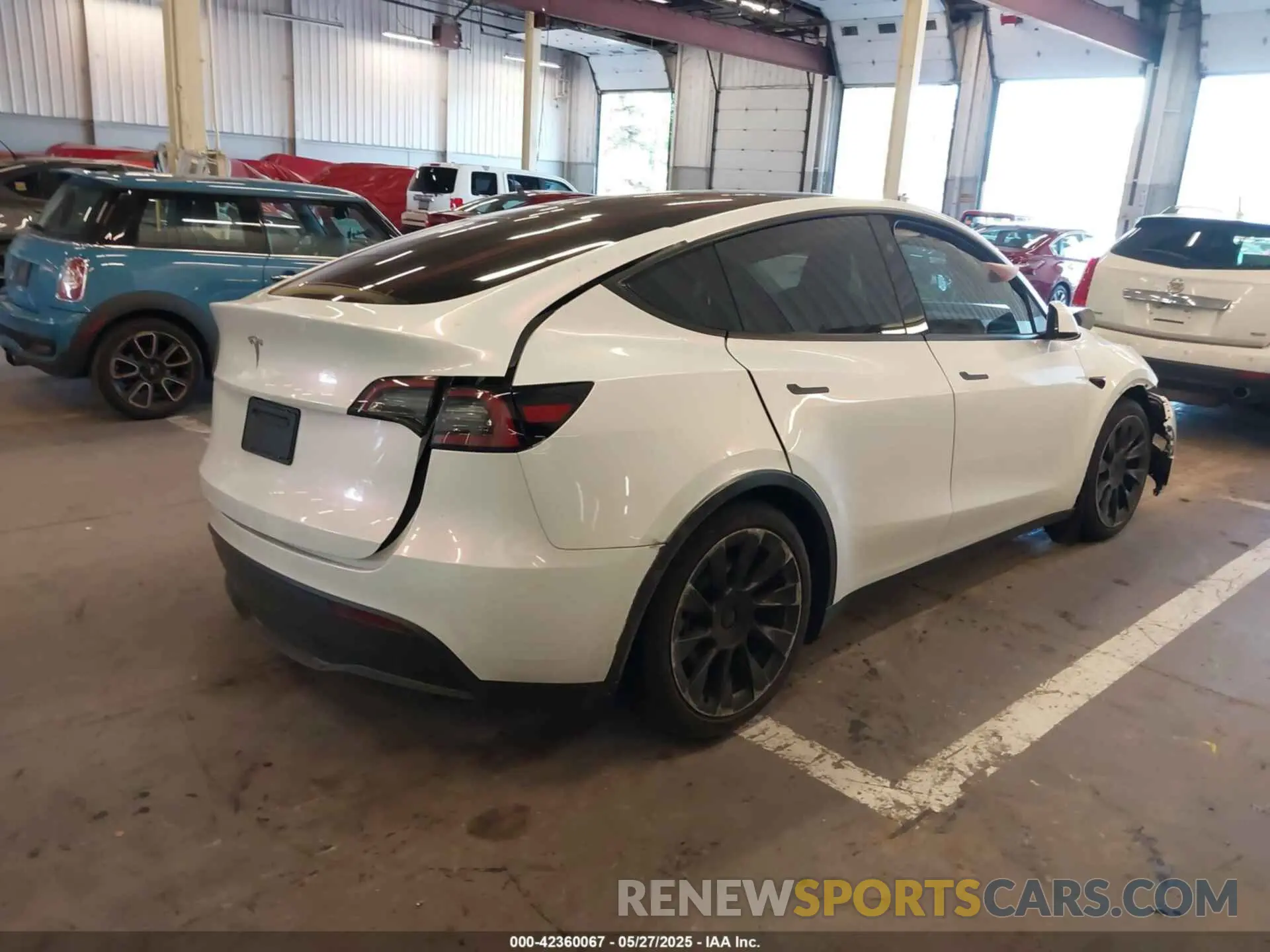 4 Photograph of a damaged car 7SAYGDEE7PF936772 TESLA MODEL Y 2023