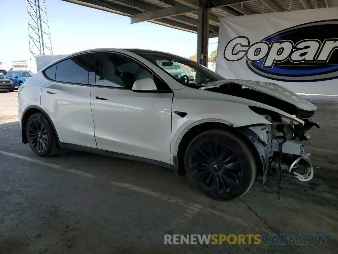4 Photograph of a damaged car 7SAYGDEE8PF620703 TESLA MODEL Y 2023