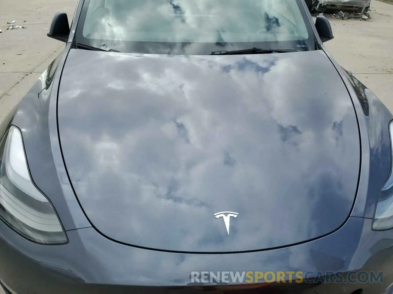 12 Photograph of a damaged car 7SAYGDEE8PF899389 TESLA MODEL Y 2023