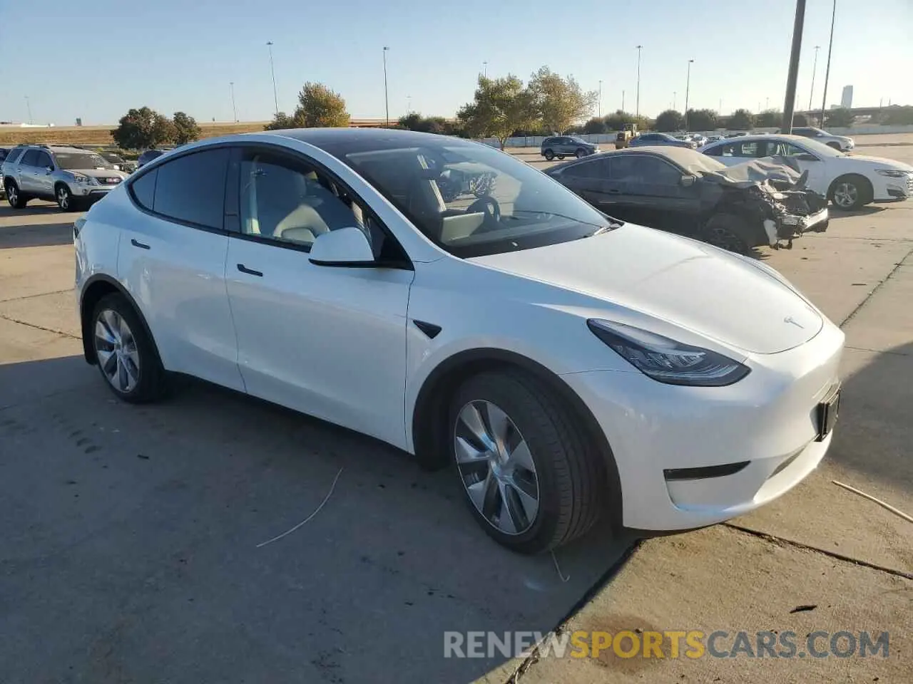 4 Photograph of a damaged car 7SAYGDEE9PA099715 TESLA MODEL Y 2023