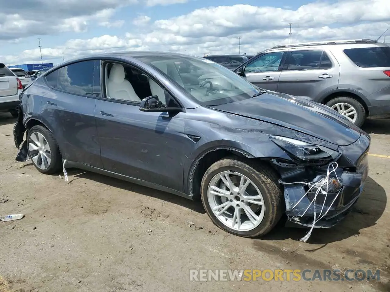 4 Photograph of a damaged car 7SAYGDEE9PF695295 TESLA MODEL Y 2023