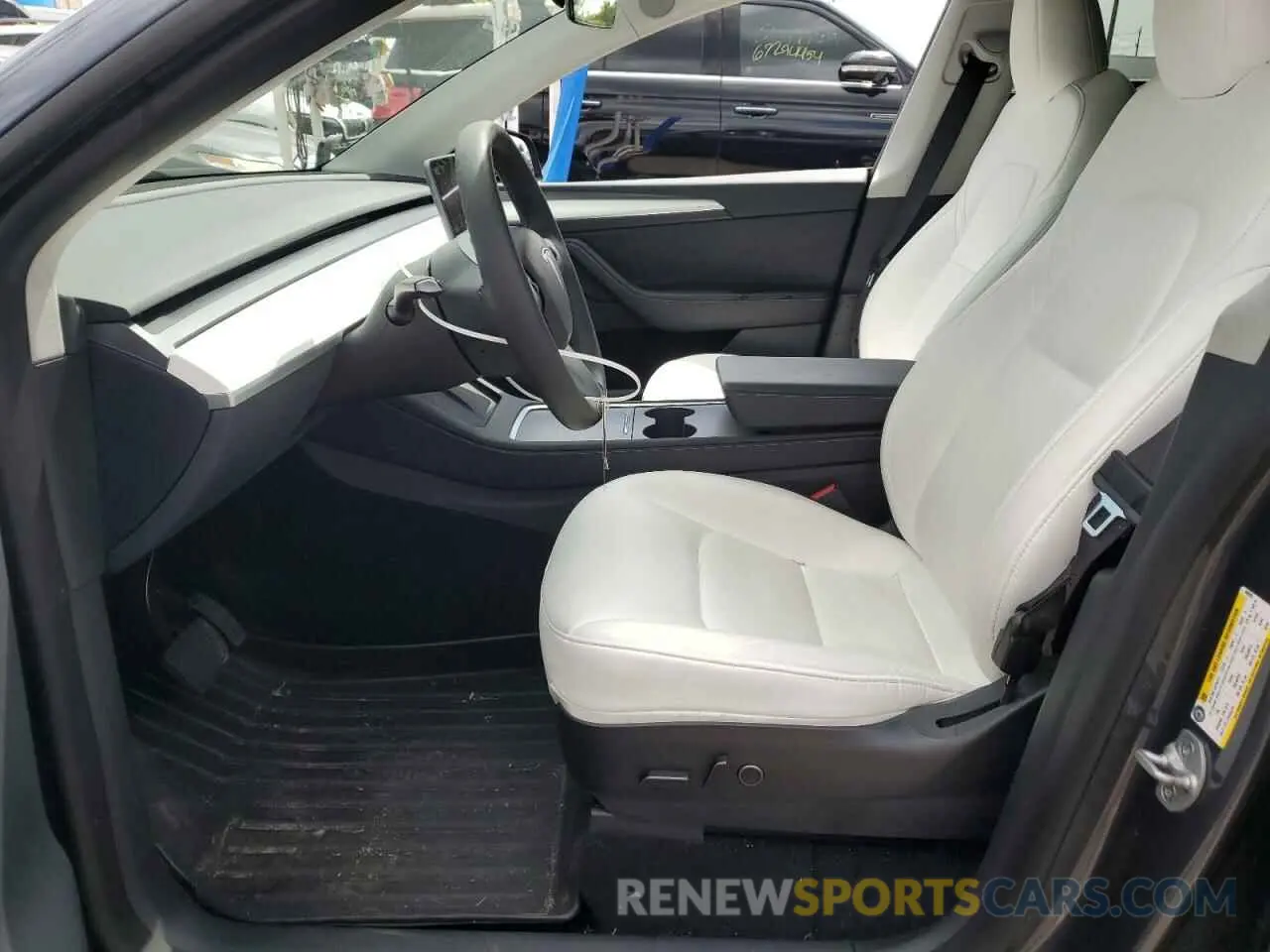 7 Photograph of a damaged car 7SAYGDEE9PF695295 TESLA MODEL Y 2023