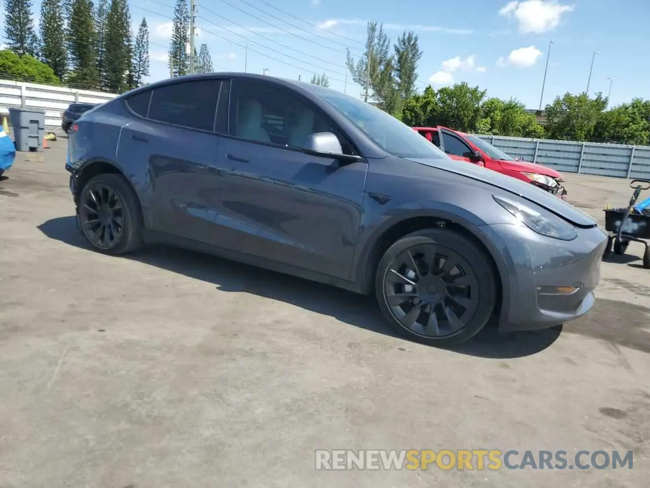 4 Photograph of a damaged car 7SAYGDEE9PF748268 TESLA MODEL Y 2023