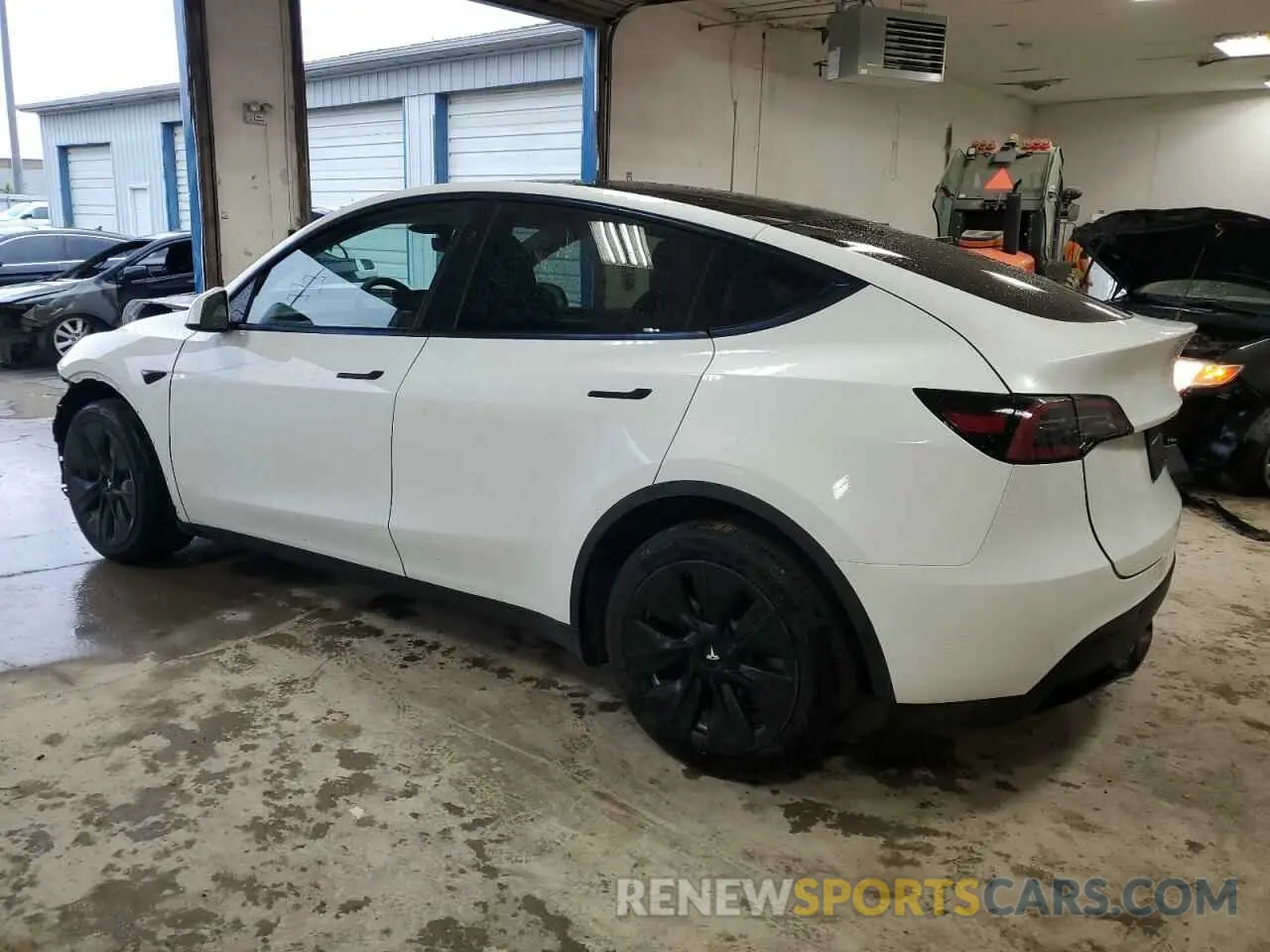 2 Photograph of a damaged car 7SAYGDEE9PF805214 TESLA MODEL Y 2023