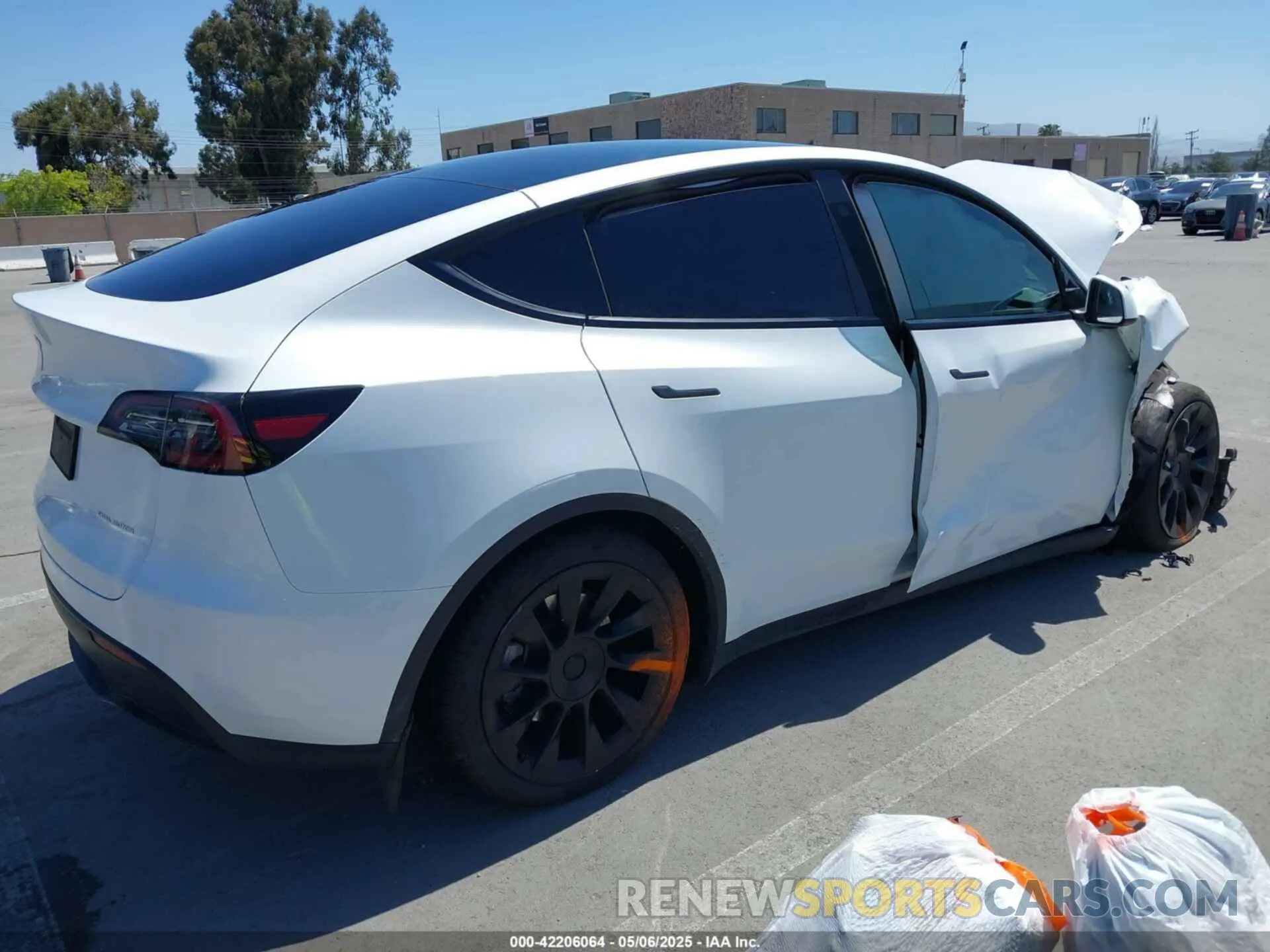 4 Photograph of a damaged car 7SAYGDEE9PF811580 TESLA MODEL Y 2023
