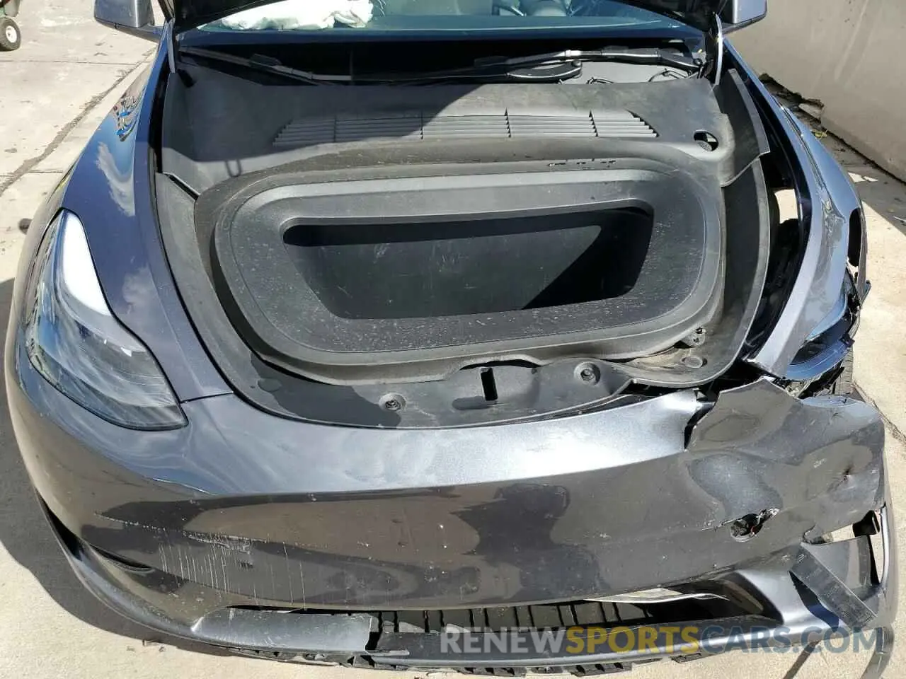 12 Photograph of a damaged car 7SAYGDEE9PF838911 TESLA MODEL Y 2023