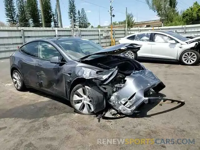 11 Photograph of a damaged car 7SAYGDEE9PF885405 TESLA MODEL Y 2023