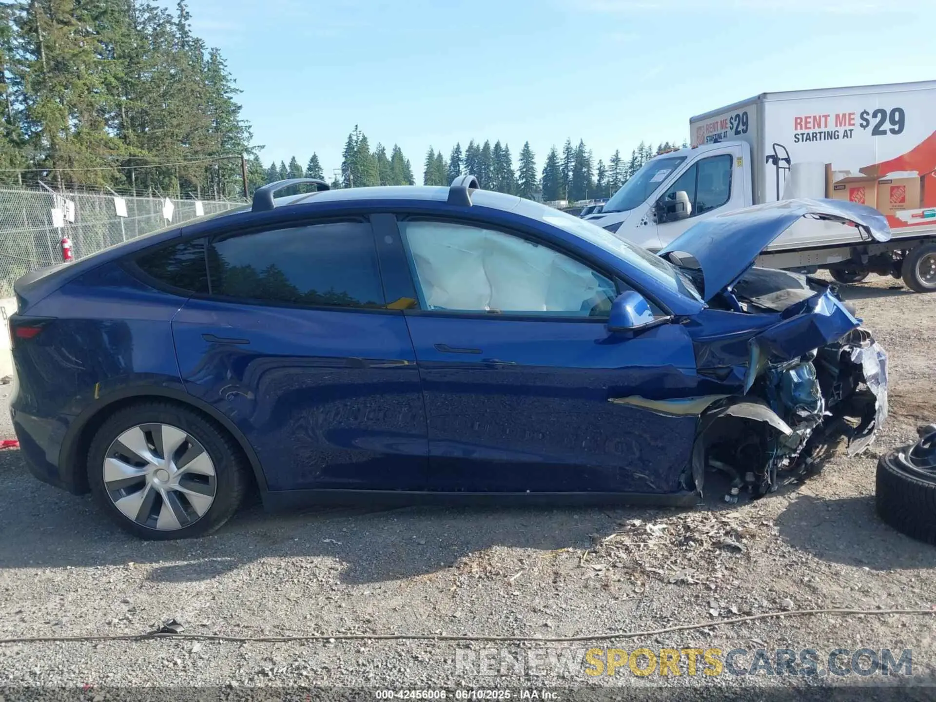 12 Photograph of a damaged car 7SAYGDEE9PF917186 TESLA MODEL Y 2023
