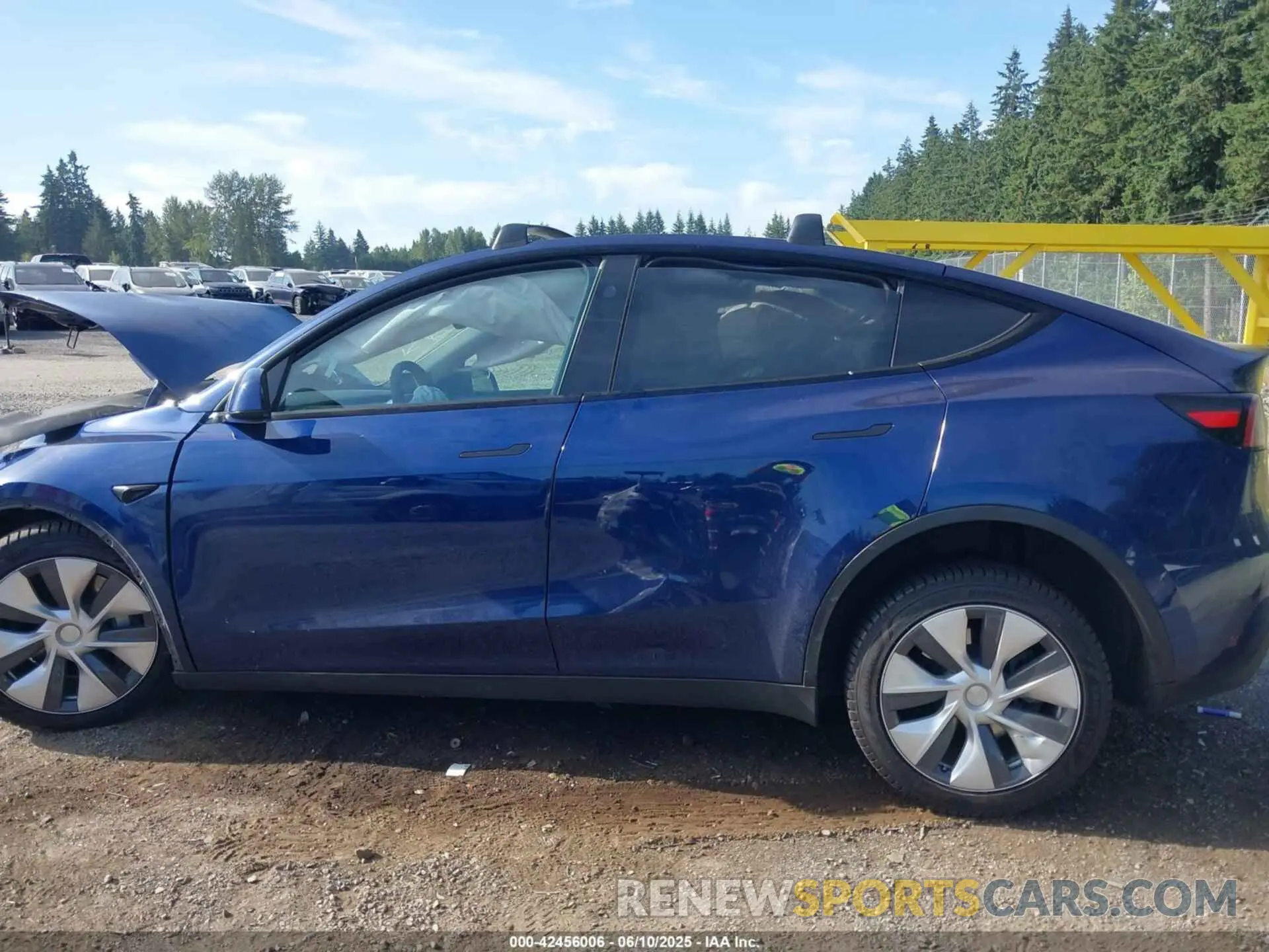 13 Photograph of a damaged car 7SAYGDEE9PF917186 TESLA MODEL Y 2023