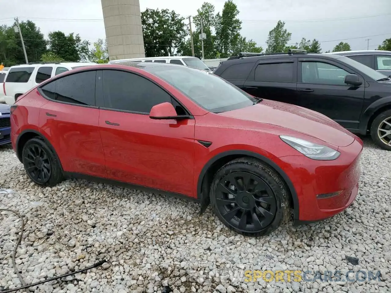 4 Photograph of a damaged car 7SAYGDEEXPA024652 TESLA MODEL Y 2023