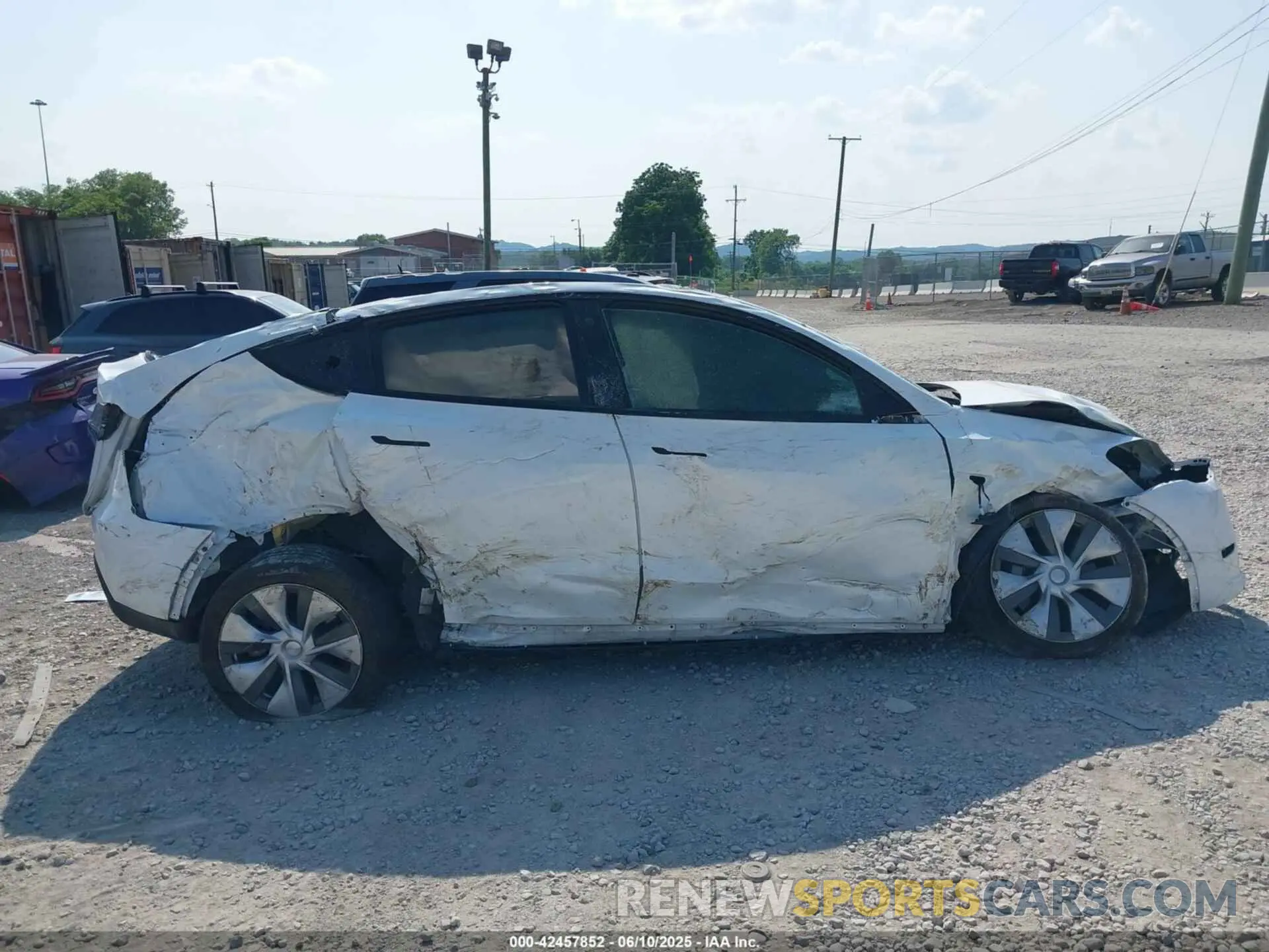 12 Photograph of a damaged car 7SAYGDEEXPA034663 TESLA MODEL Y 2023
