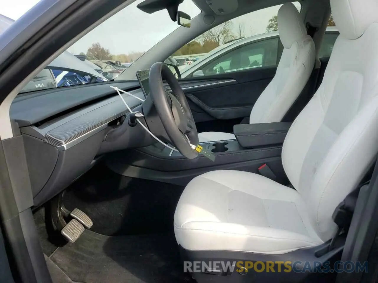7 Photograph of a damaged car 7SAYGDEEXPA053777 TESLA MODEL Y 2023