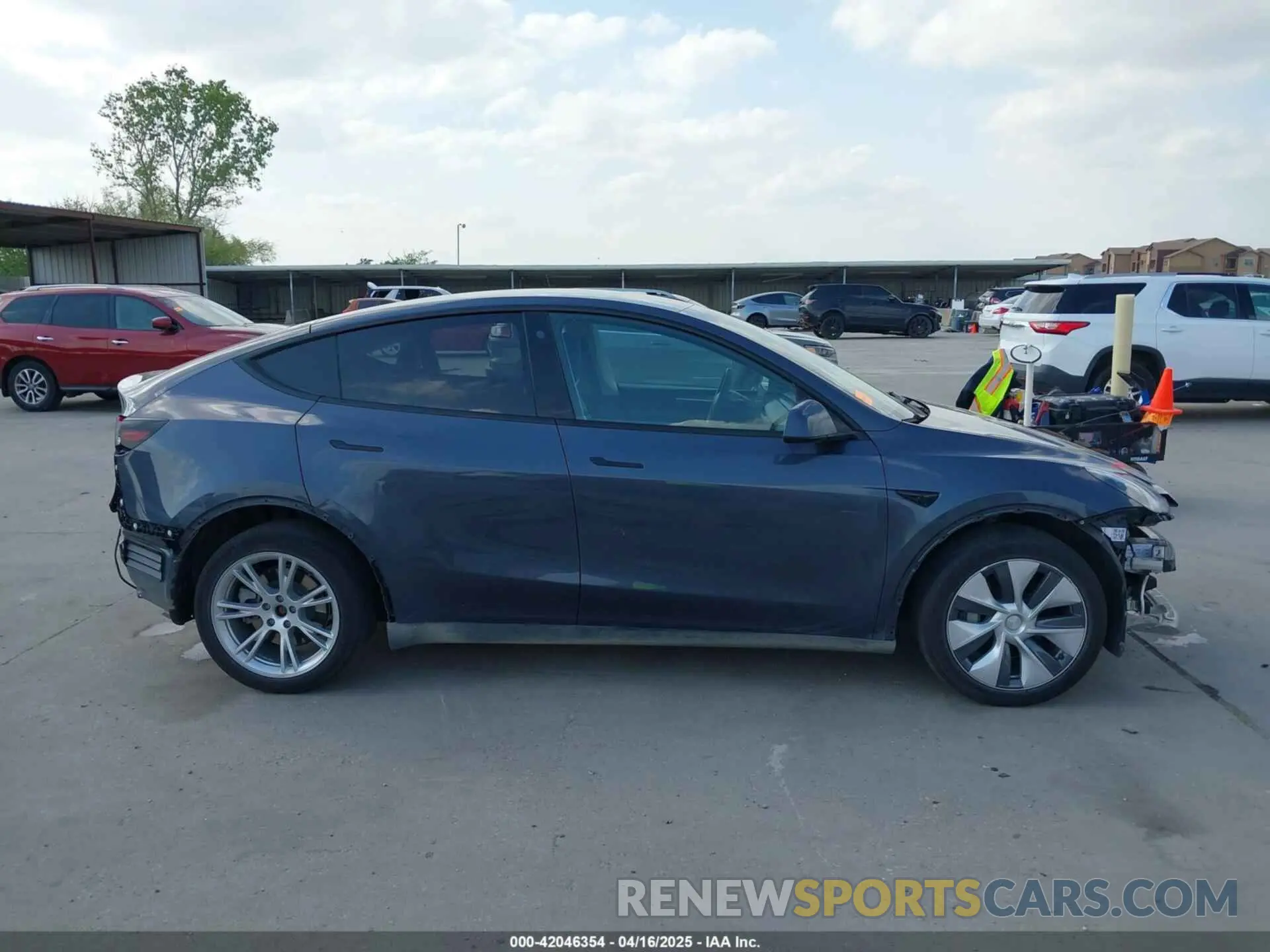 13 Photograph of a damaged car 7SAYGDEEXPA078629 TESLA MODEL Y 2023
