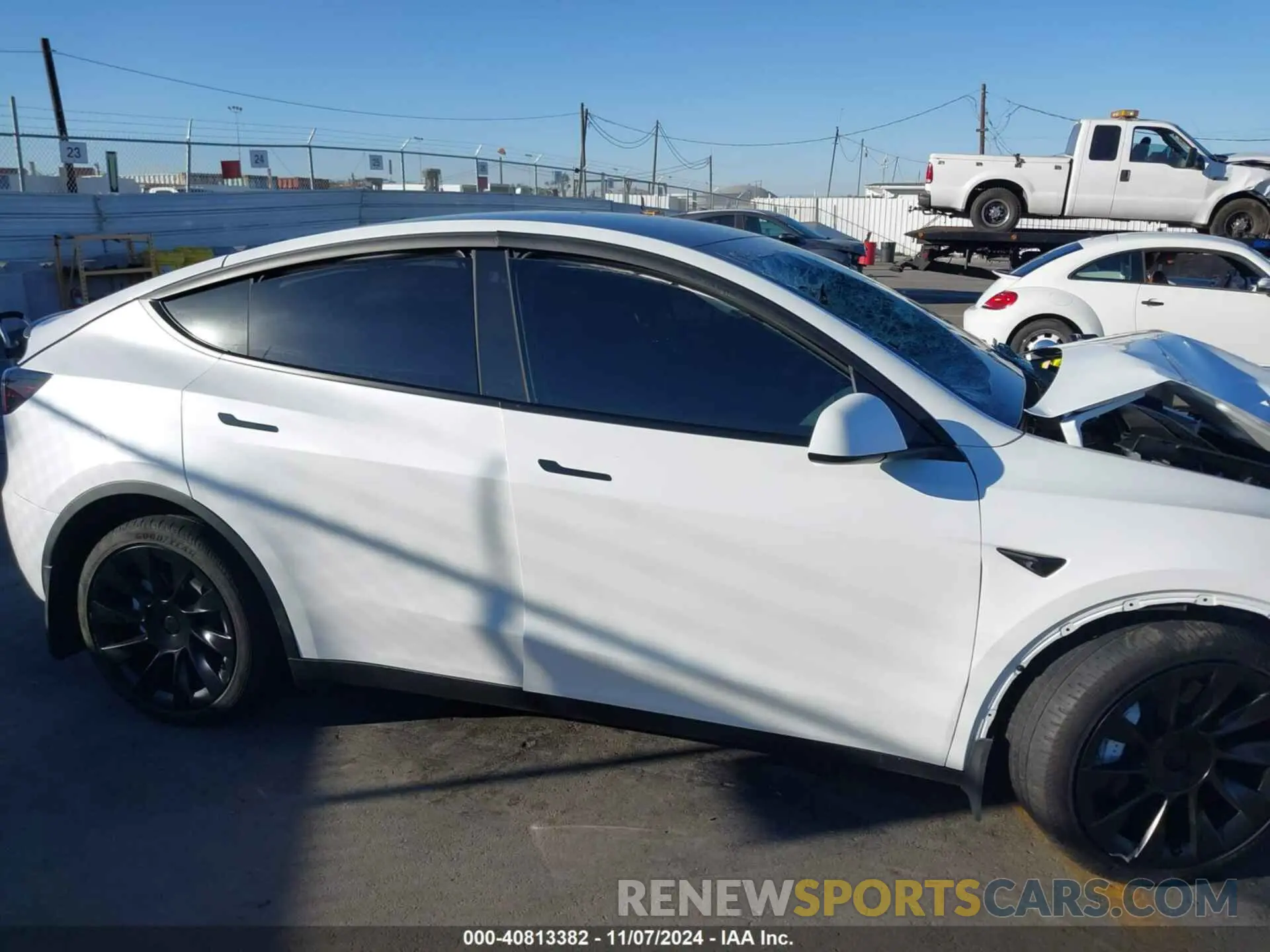 13 Photograph of a damaged car 7SAYGDEEXPA126856 TESLA MODEL Y 2023