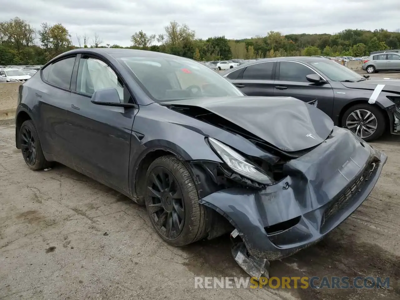 4 Photograph of a damaged car 7SAYGDEEXPA138229 TESLA MODEL Y 2023