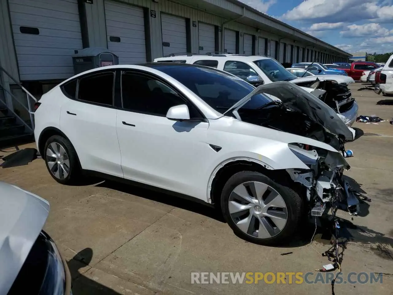 4 Photograph of a damaged car 7SAYGDEEXPA162918 TESLA MODEL Y 2023