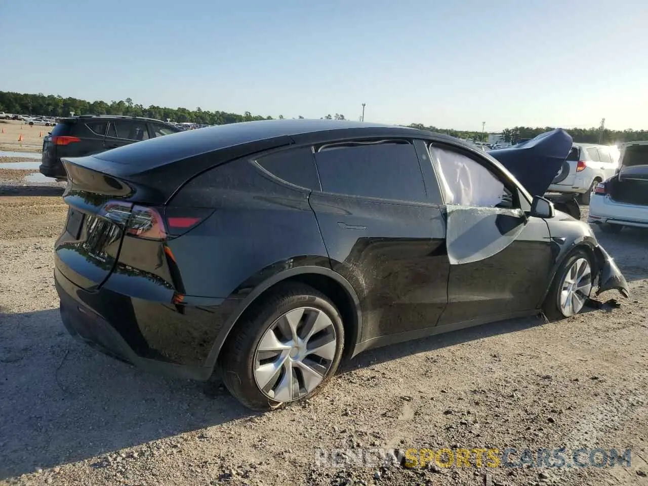 3 Photograph of a damaged car 7SAYGDEEXPA171831 TESLA MODEL Y 2023