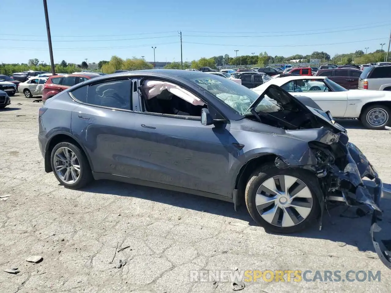 4 Photograph of a damaged car 7SAYGDEEXPA175250 TESLA MODEL Y 2023