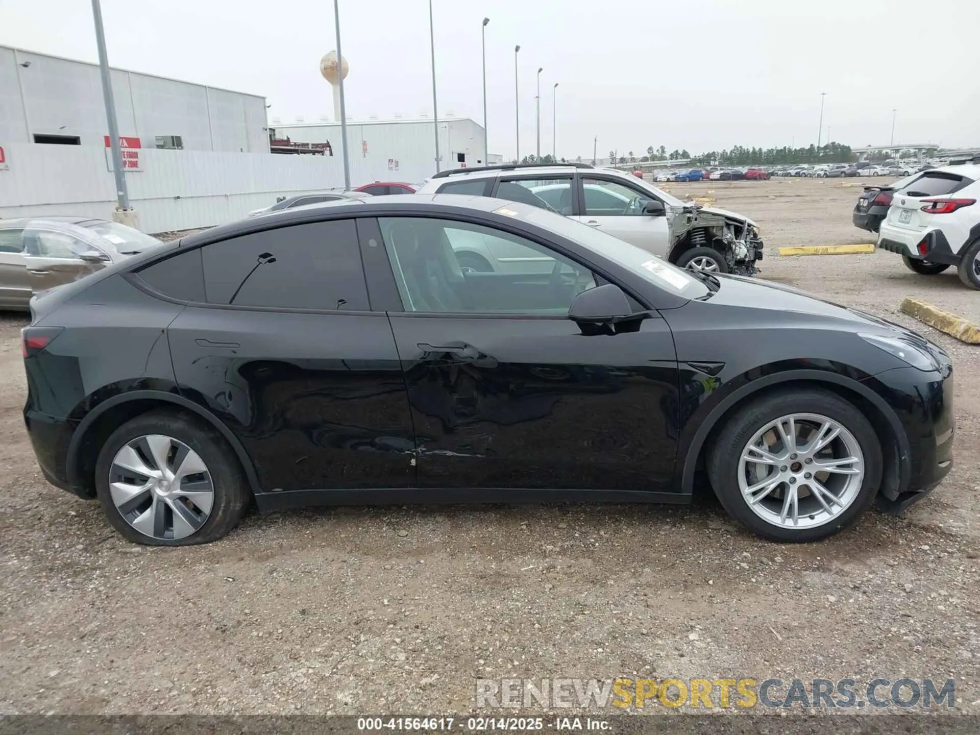14 Photograph of a damaged car 7SAYGDEEXPA181114 TESLA MODEL Y 2023