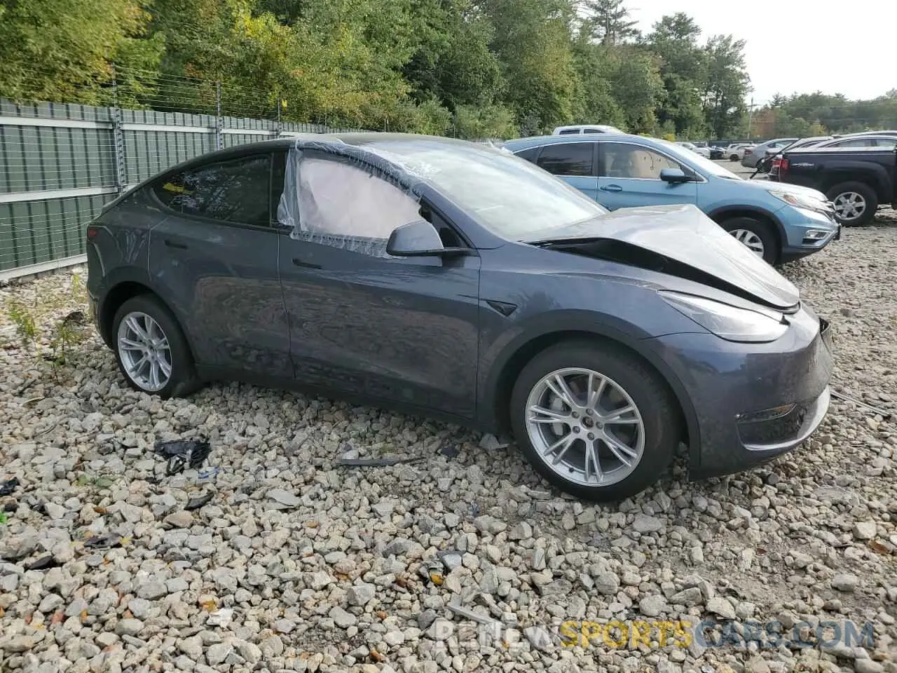 4 Photograph of a damaged car 7SAYGDEEXPA202737 TESLA MODEL Y 2023