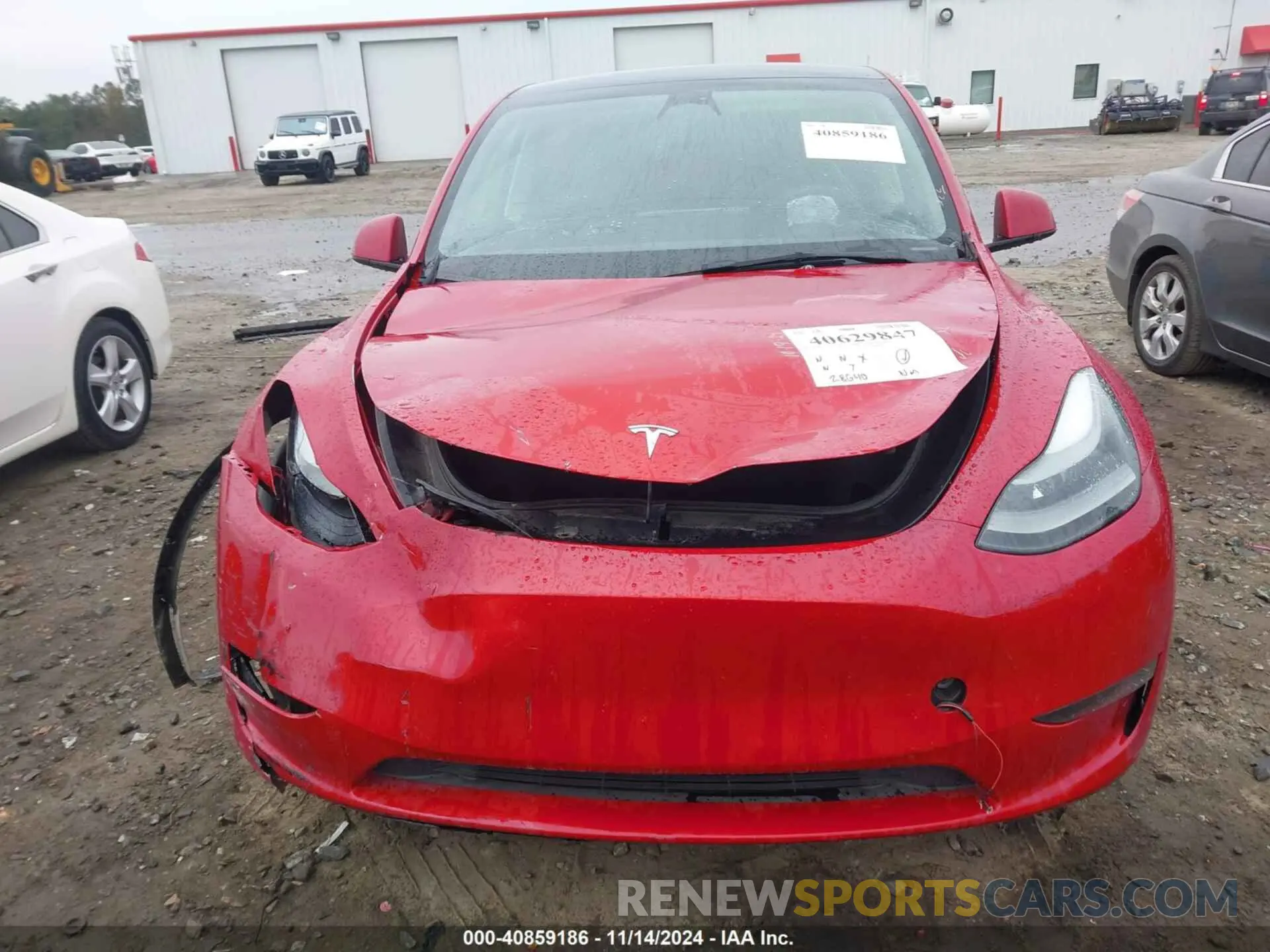 12 Photograph of a damaged car 7SAYGDEEXPF685584 TESLA MODEL Y 2023