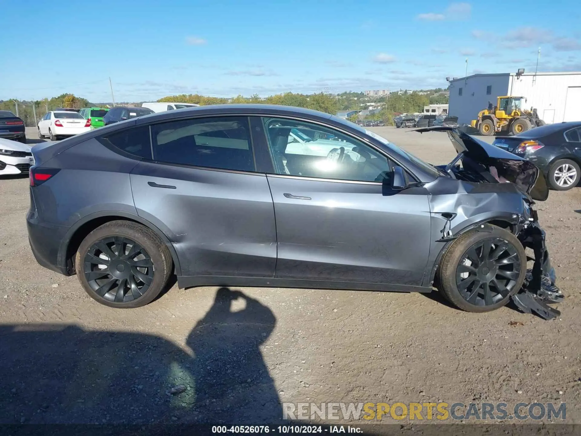 12 Photograph of a damaged car 7SAYGDEEXPF766262 TESLA MODEL Y 2023