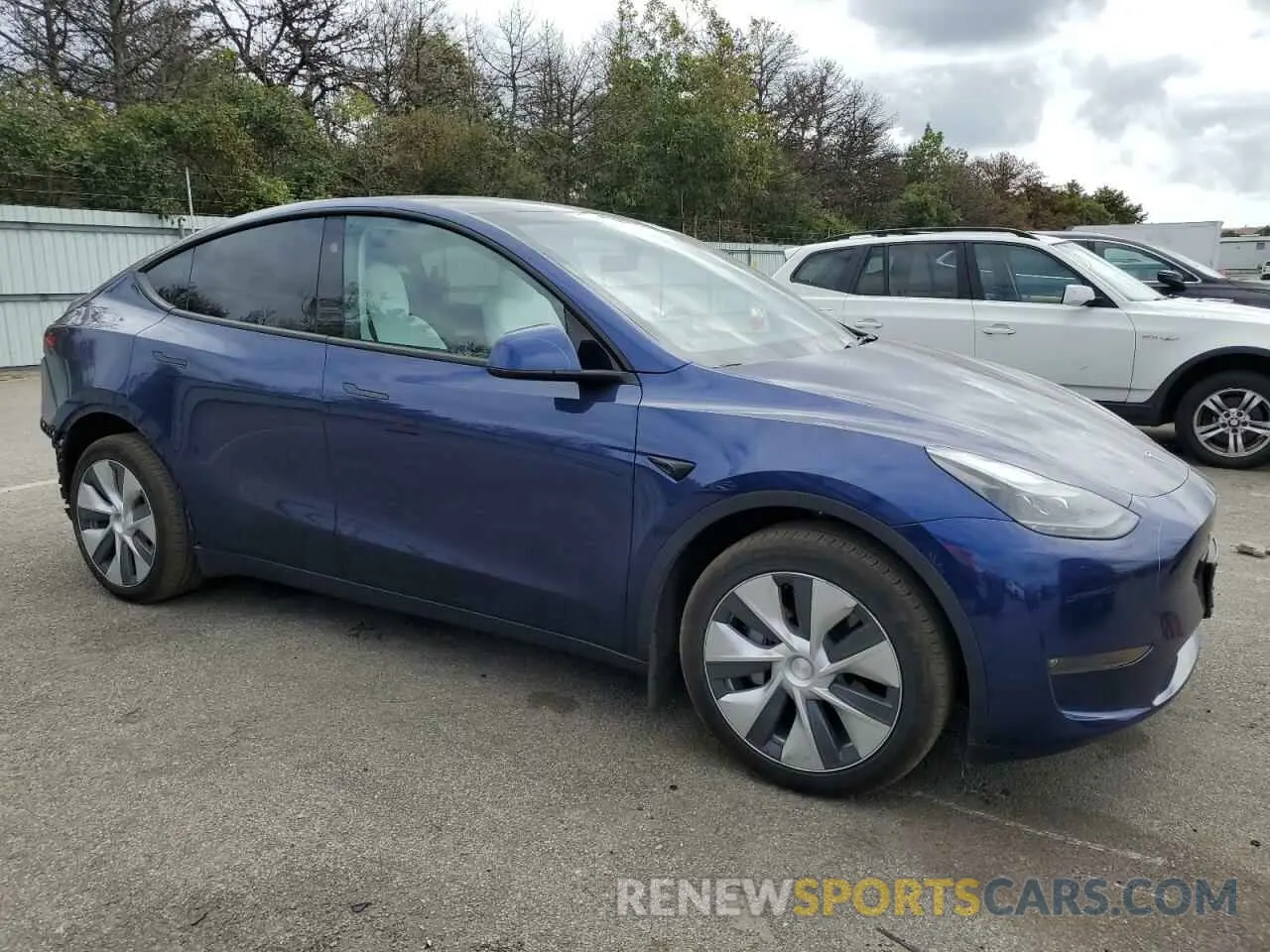 4 Photograph of a damaged car 7SAYGDEEXPF799228 TESLA MODEL Y 2023