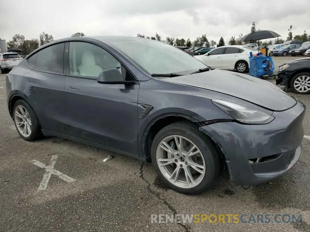 4 Photograph of a damaged car 7SAYGDEEXPF852736 TESLA MODEL Y 2023