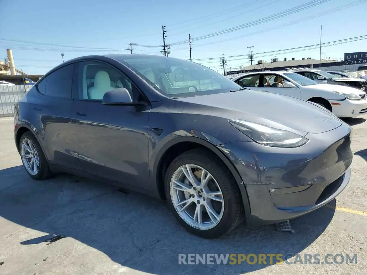 4 Photograph of a damaged car 7SAYGDEEXPF889351 TESLA MODEL Y 2023