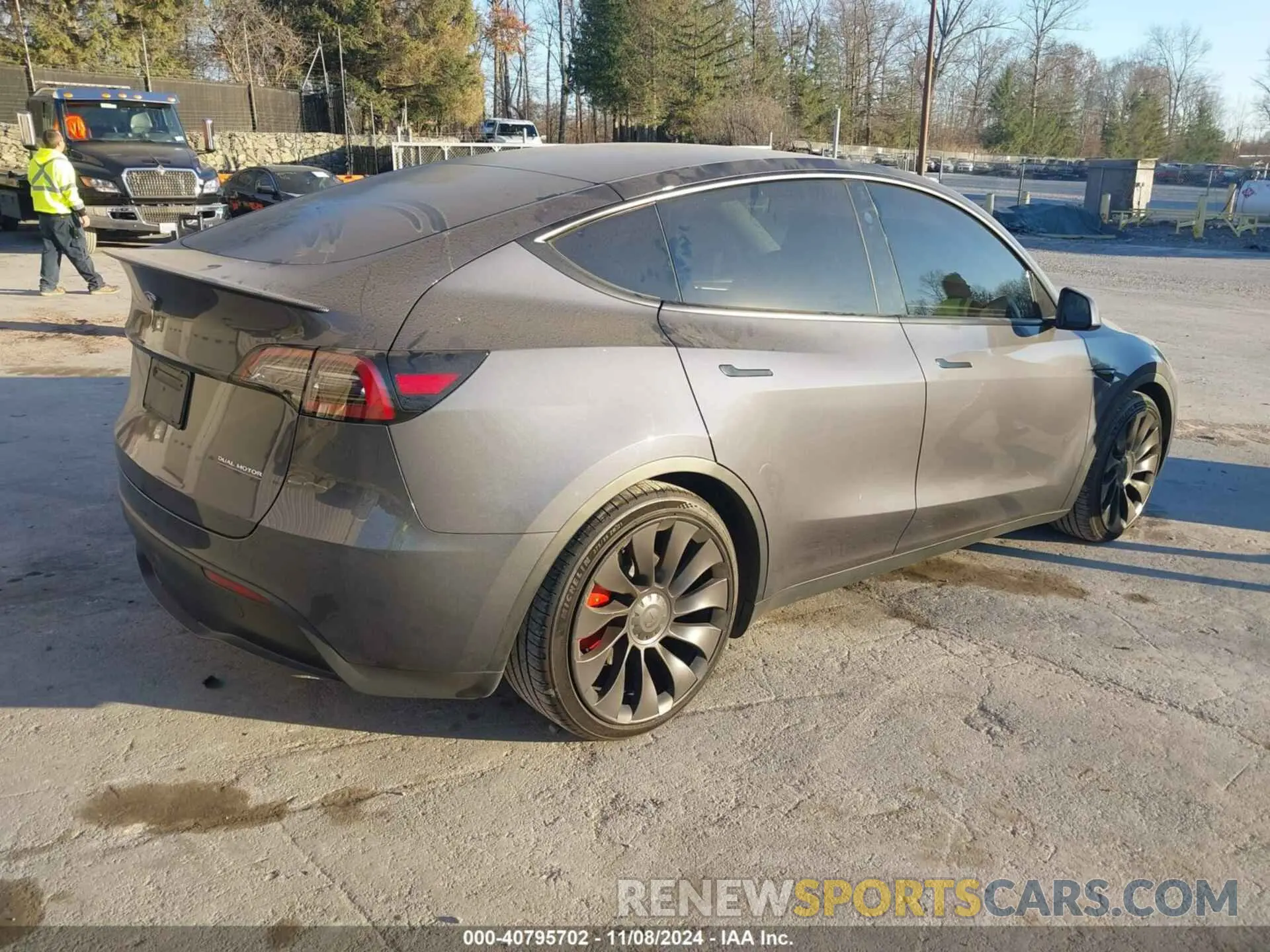 4 Photograph of a damaged car 7SAYGDEF0PF830009 TESLA MODEL Y 2023