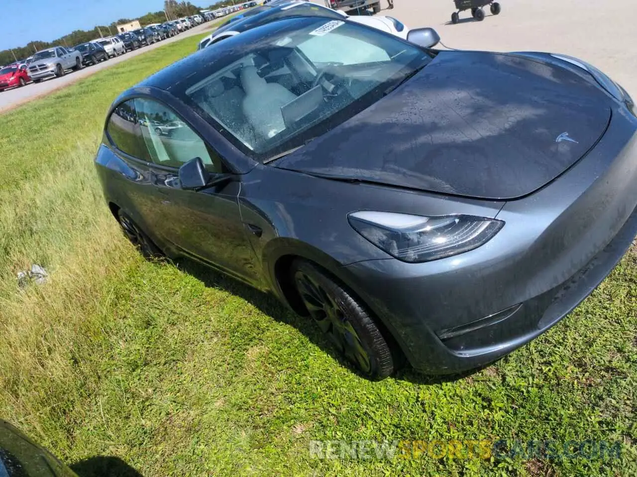 4 Photograph of a damaged car 7SAYGDEF0PF843665 TESLA MODEL Y 2023