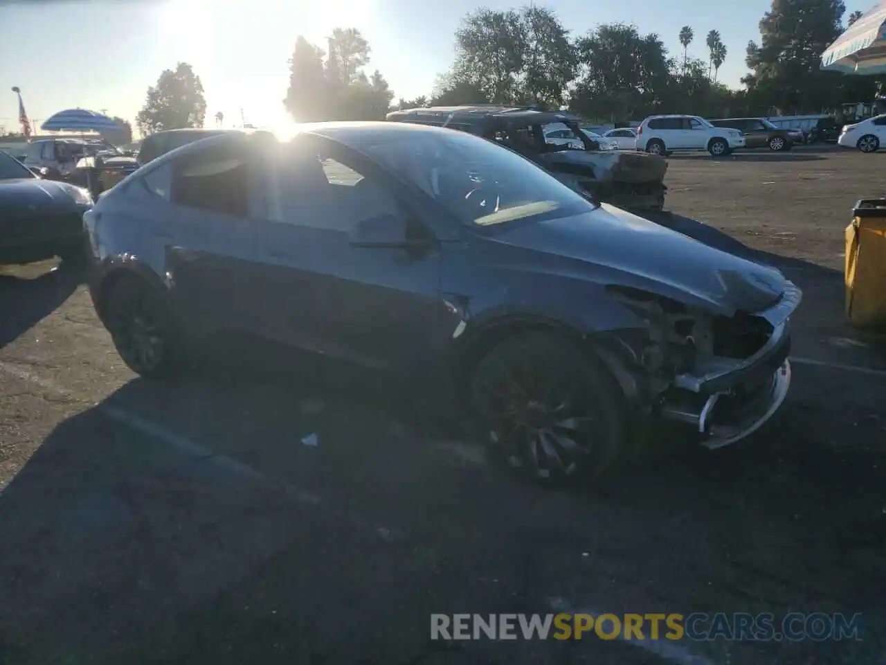 4 Photograph of a damaged car 7SAYGDEF0PF960758 TESLA MODEL Y 2023