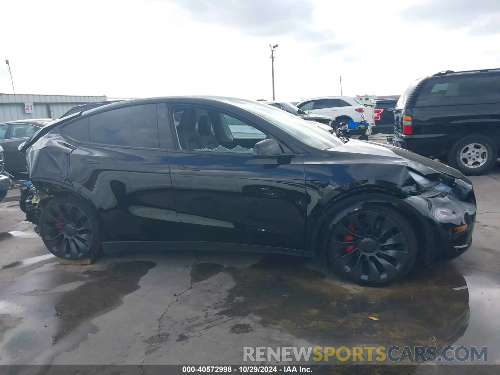 13 Photograph of a damaged car 7SAYGDEF0PF972179 TESLA MODEL Y 2023