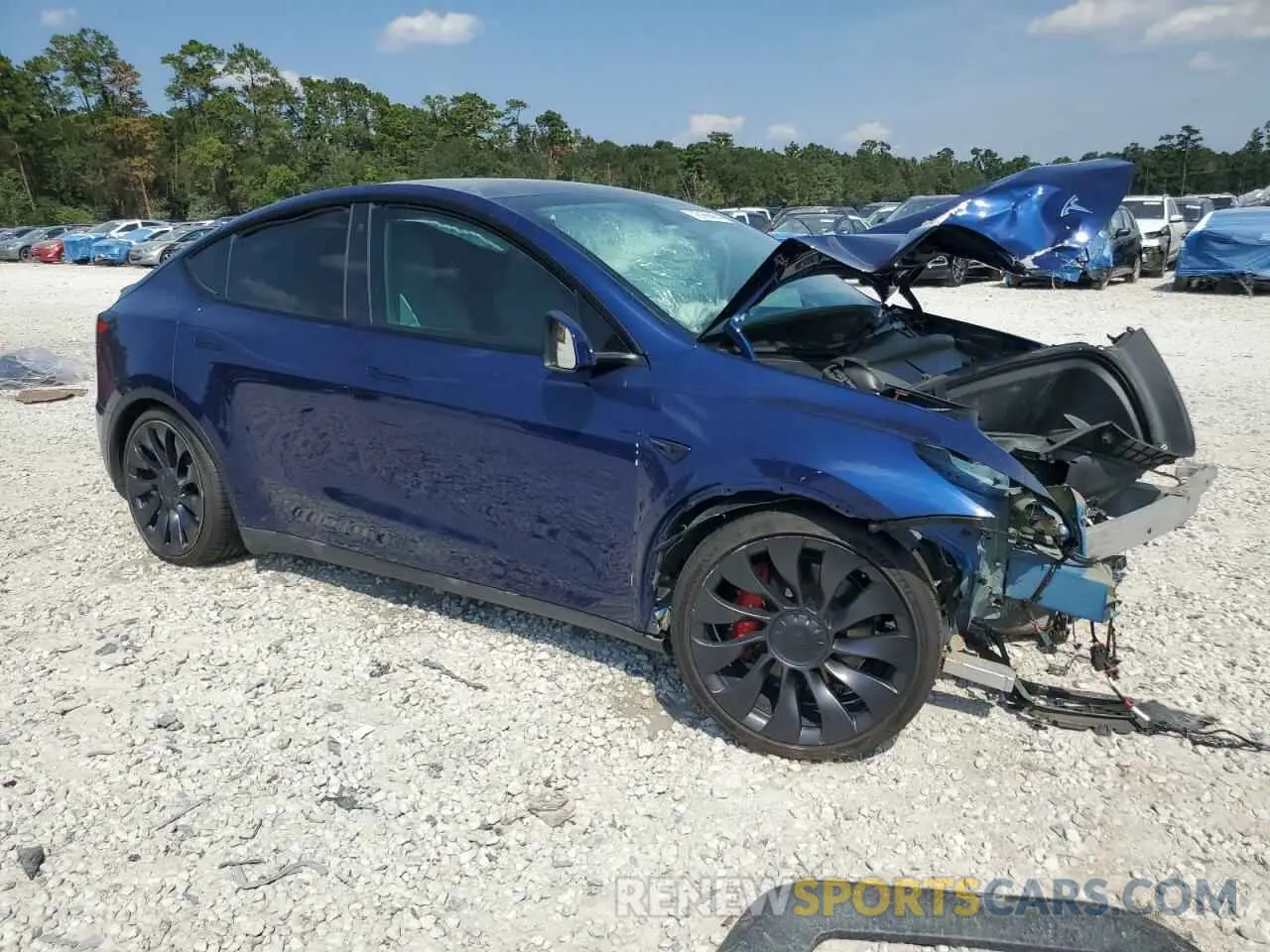 4 Photograph of a damaged car 7SAYGDEF1PF712342 TESLA MODEL Y 2023