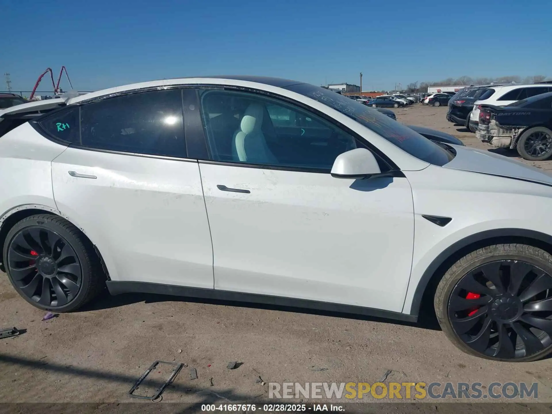 12 Photograph of a damaged car 7SAYGDEF1PF864976 TESLA MODEL Y 2023