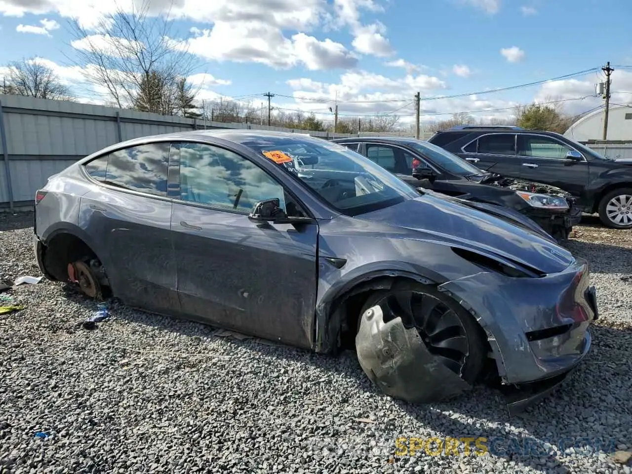 4 Photograph of a damaged car 7SAYGDEF4PF841336 TESLA MODEL Y 2023