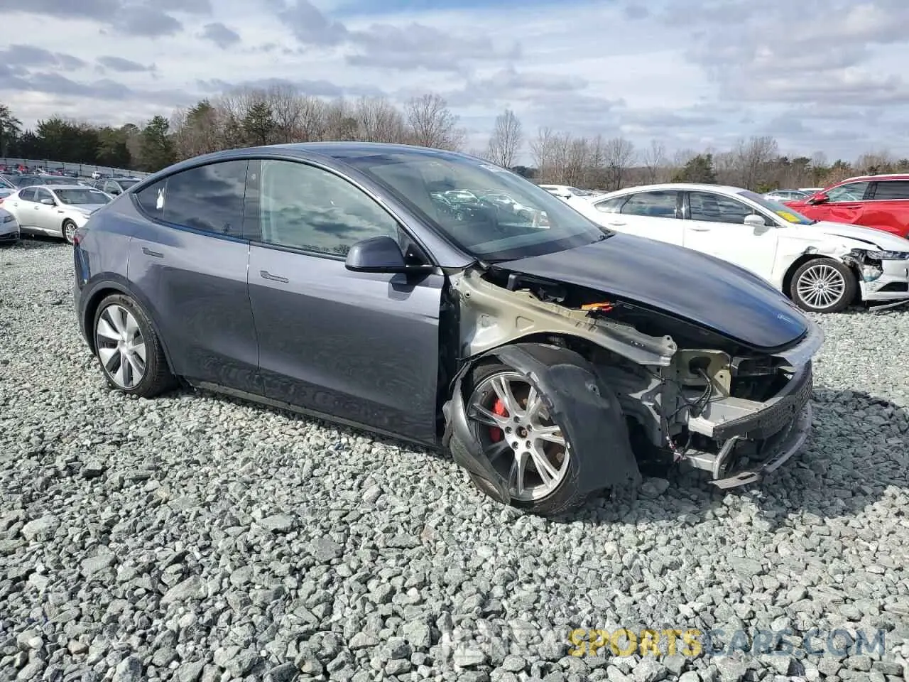 4 Photograph of a damaged car 7SAYGDEF5PF606380 TESLA MODEL Y 2023