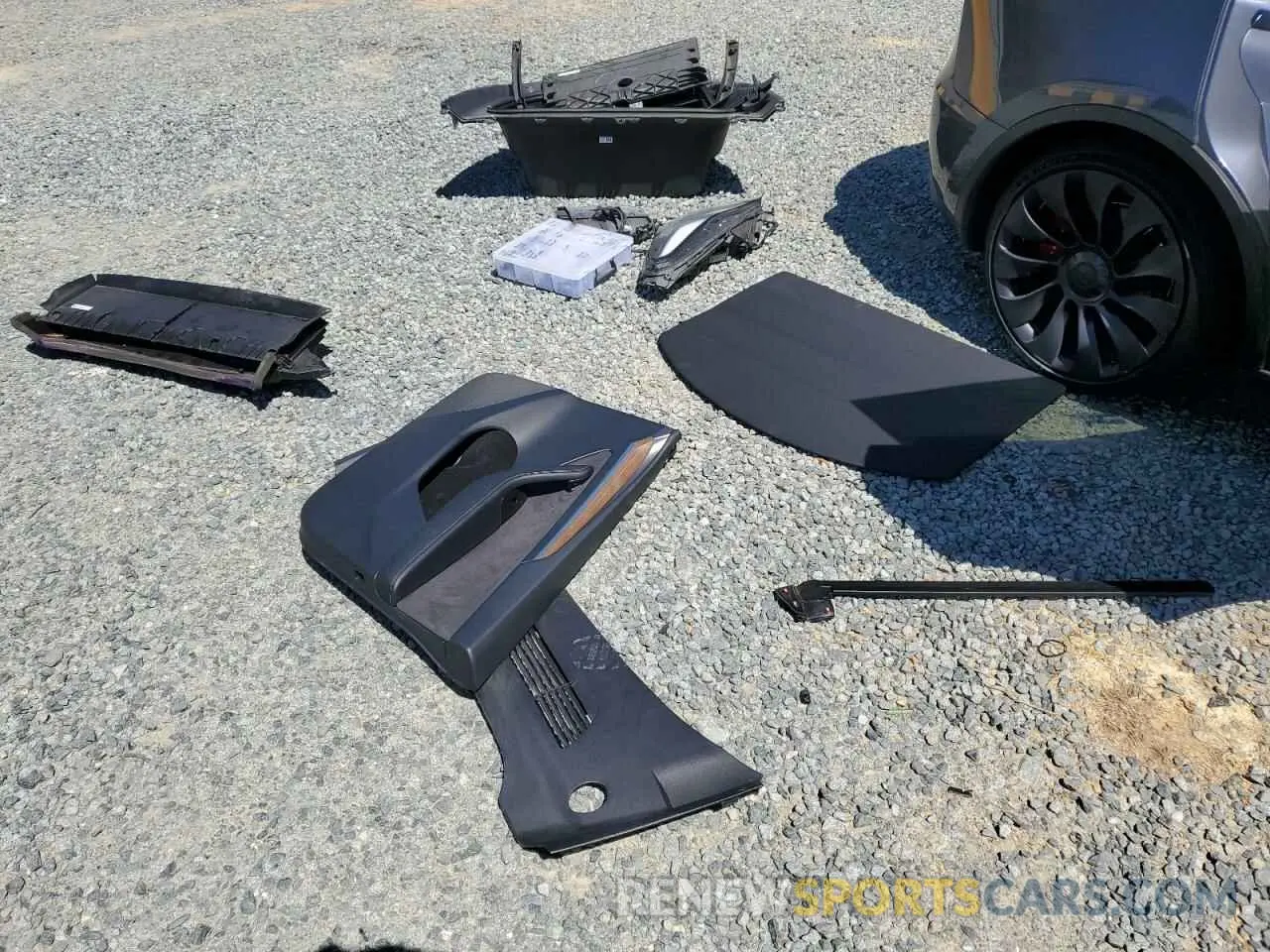 12 Photograph of a damaged car 7SAYGDEF6PF796822 TESLA MODEL Y 2023