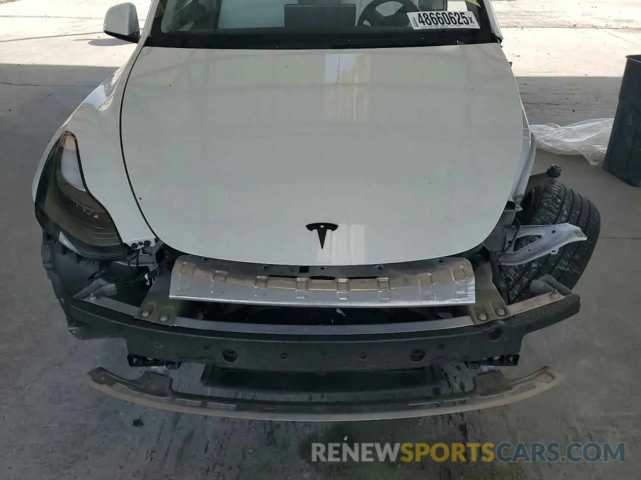 12 Photograph of a damaged car 7SAYGDEF7PF753736 TESLA MODEL Y 2023