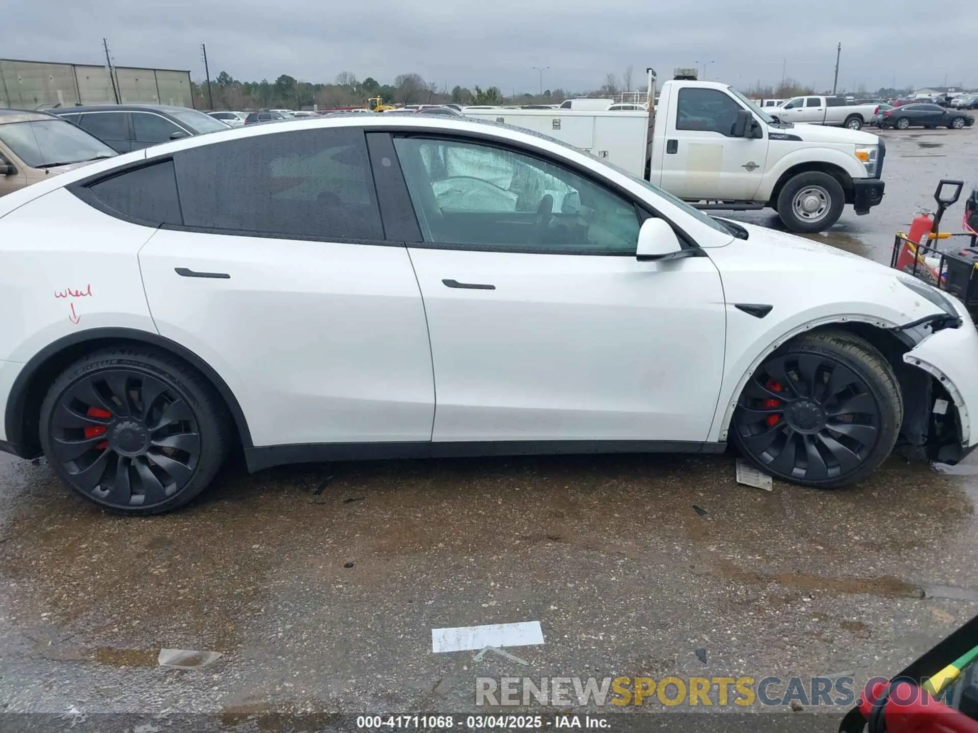 12 Photograph of a damaged car 7SAYGDEF7PF807312 TESLA MODEL Y 2023