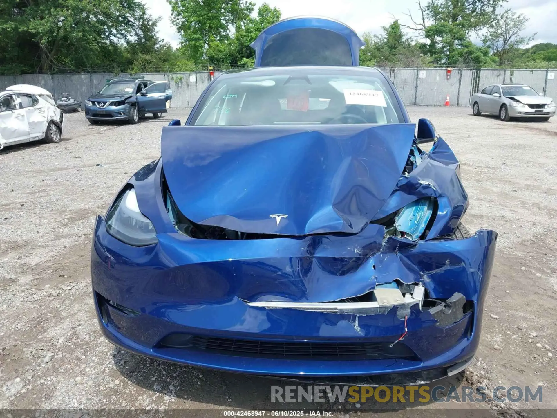 12 Photograph of a damaged car 7SAYGDEF7PF904333 TESLA MODEL Y 2023