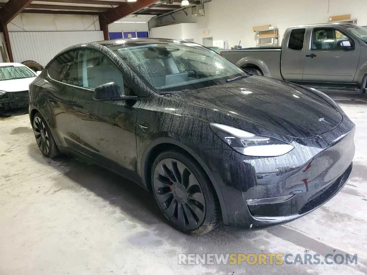 4 Photograph of a damaged car 7SAYGDEF8PF808534 TESLA MODEL Y 2023