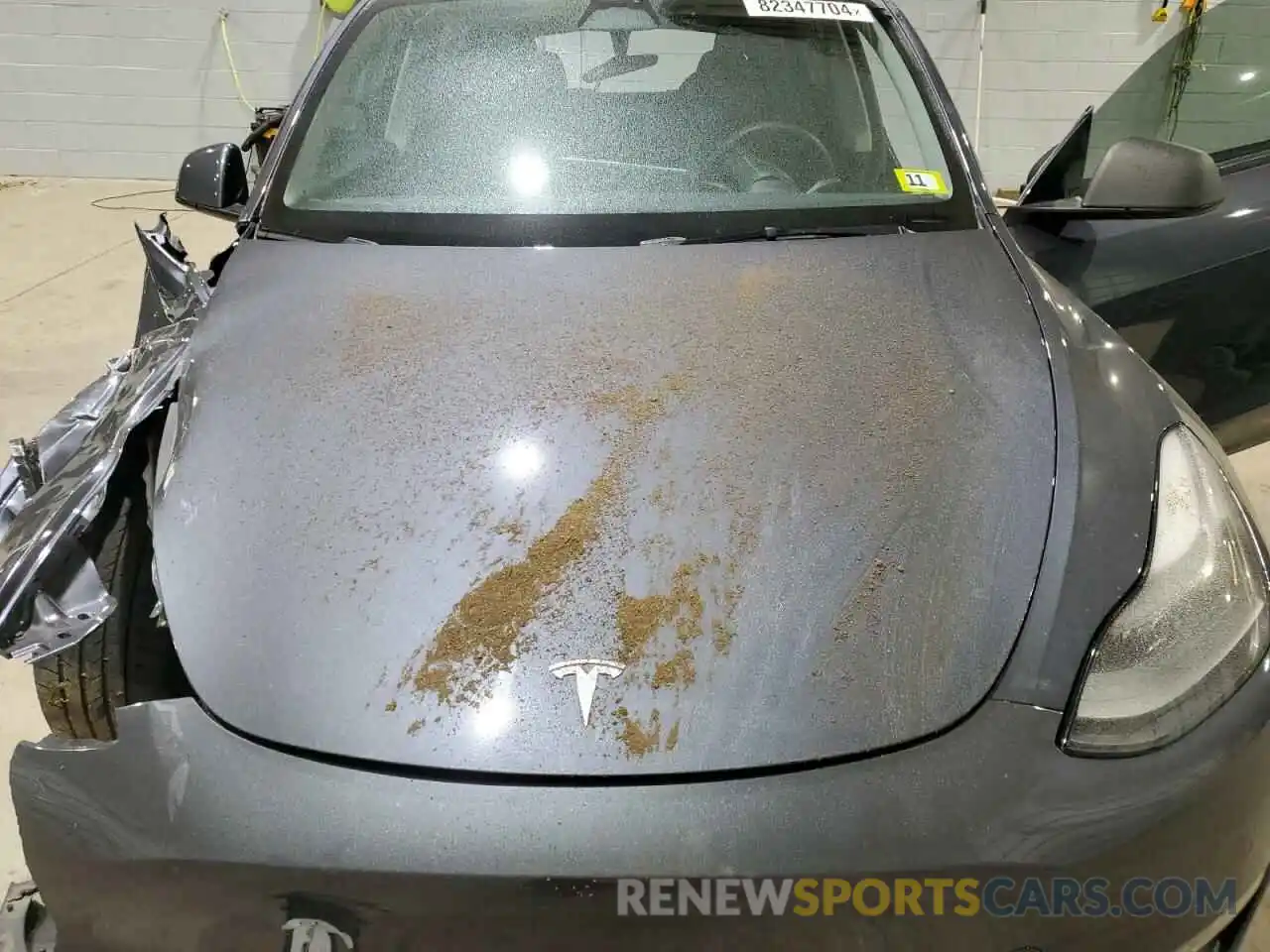 12 Photograph of a damaged car 7SAYGDEF9PF582343 TESLA MODEL Y 2023